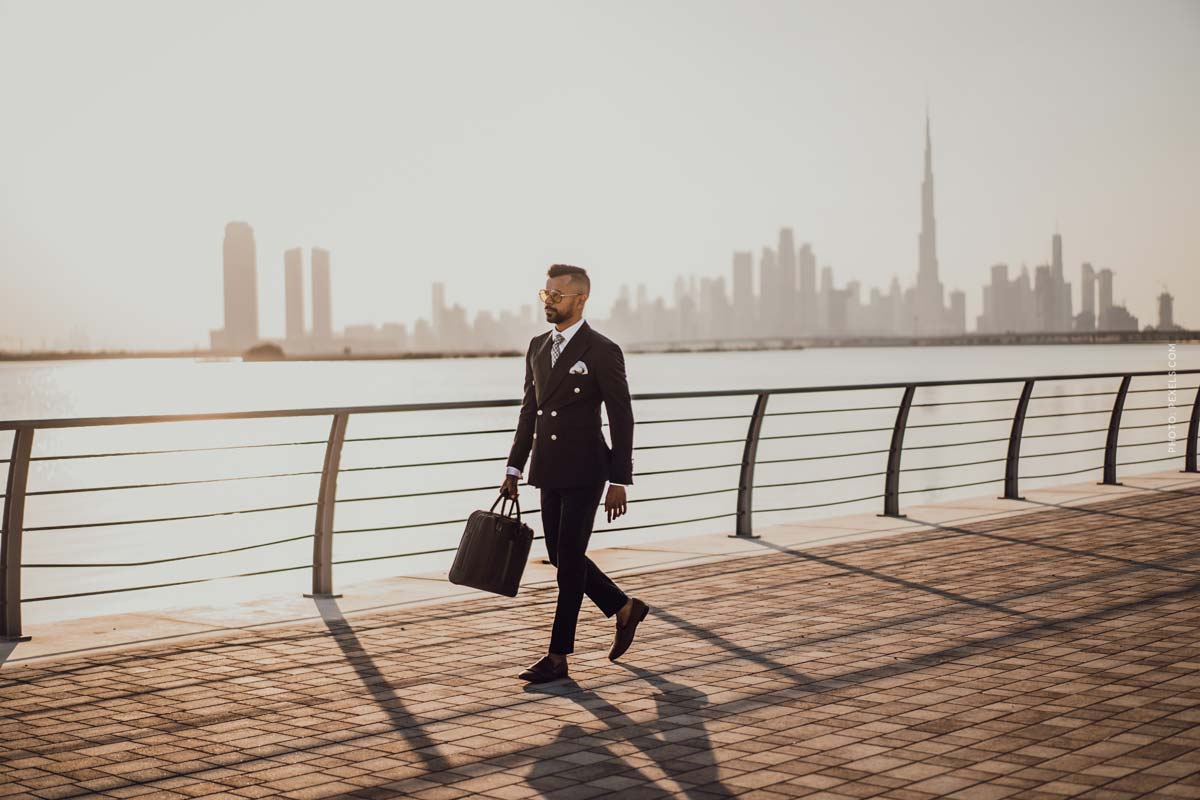 Brioni Videos: Behind the Scenes, Italian Fashion + 15 Facts about Brioni brioni-man-walking-next-to-a-river-skyline-man-wearing-suit