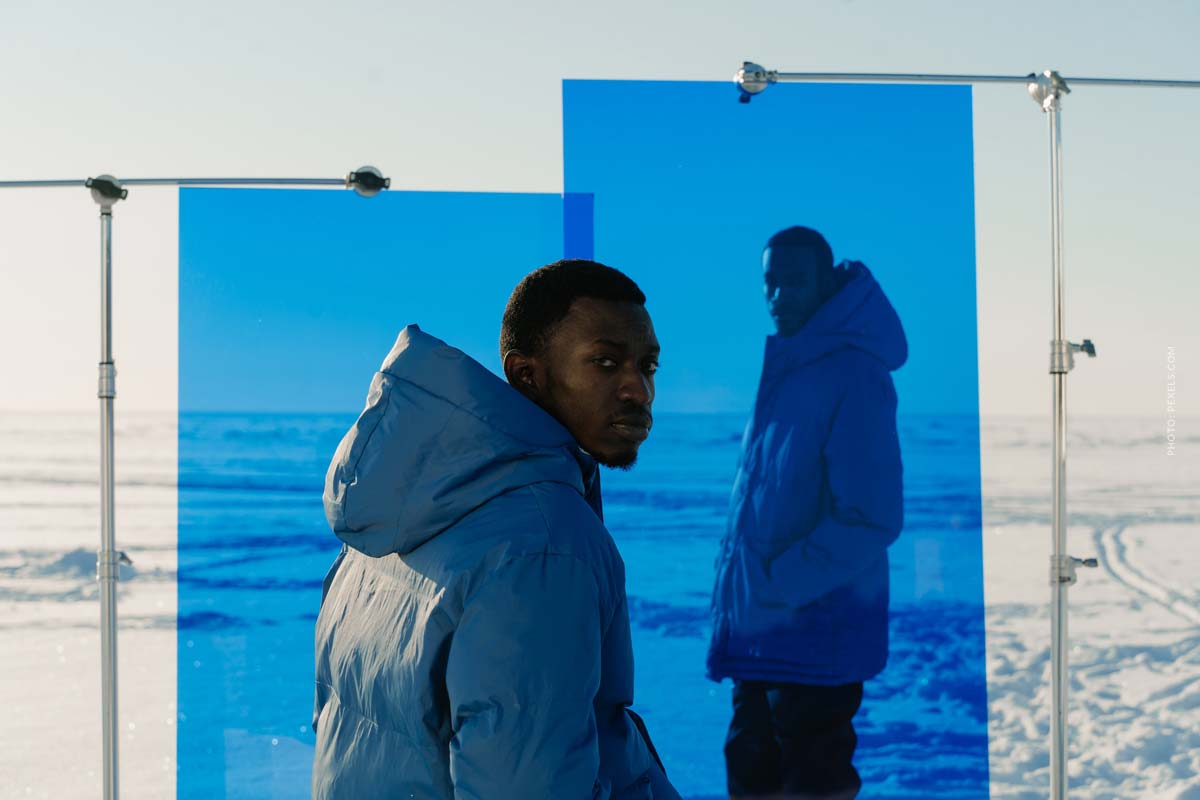 Canada Goose: brand, winter fashion, sustainability and charity canada-goose-winter-jacket-blue-snow-cold-white-man