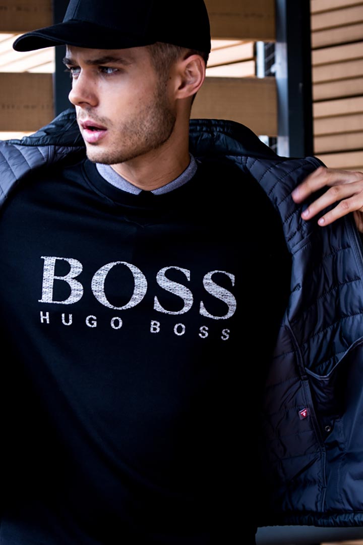 Fashion brands with H: Hugo Boss, Hermes & H&M male-model-fabian-shooting-blue-eyes-handsome-hugo-boss-fashion-cap-pullover-cover-jacket-winter